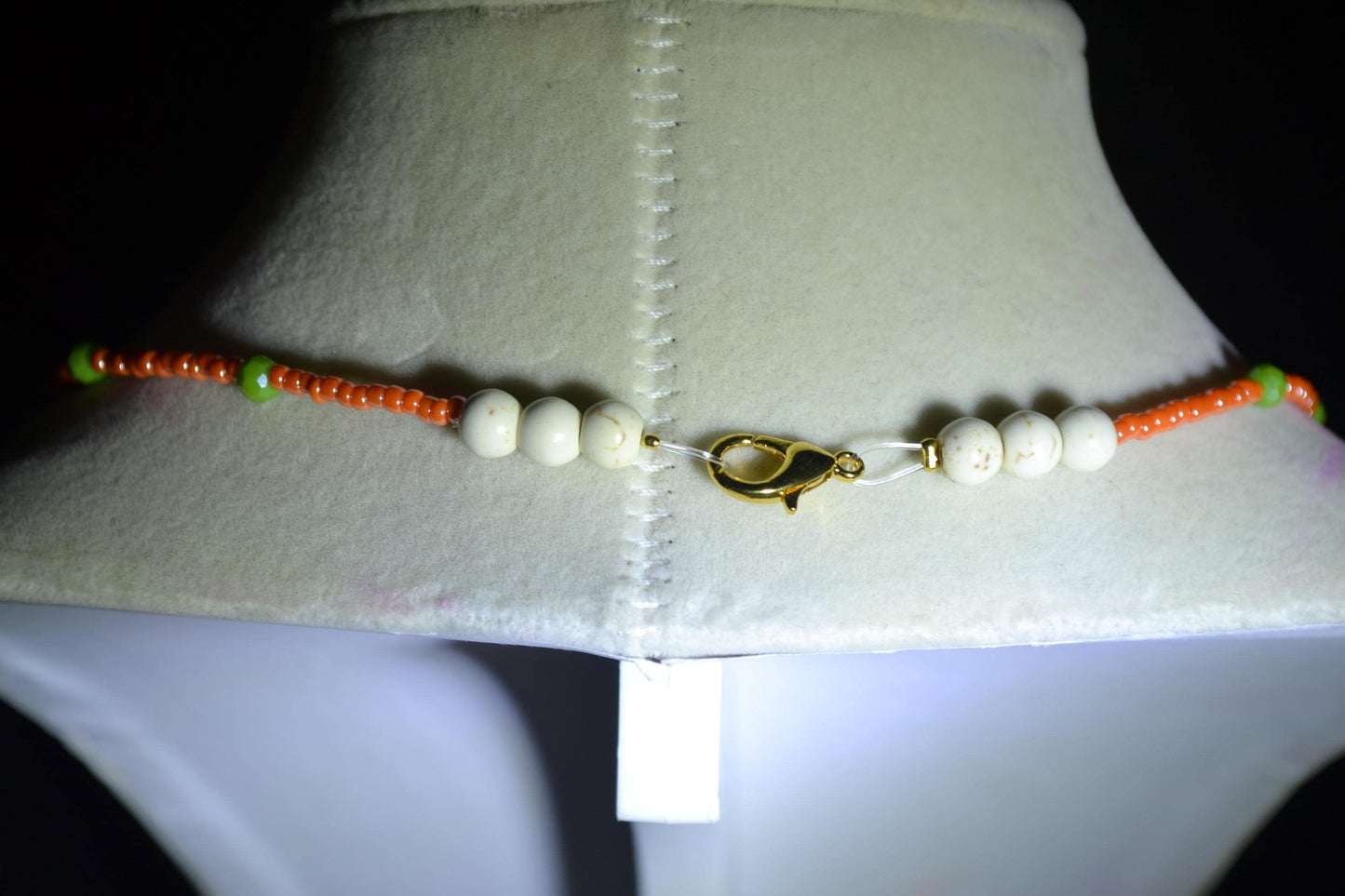 Wire wrapped sharks tooth beaded necklace. Coral and green