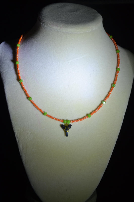 Wire wrapped sharks tooth beaded necklace. Coral and green