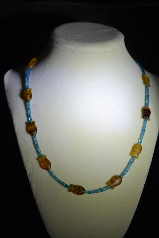 Beaded fish necklace. Blue and topaz