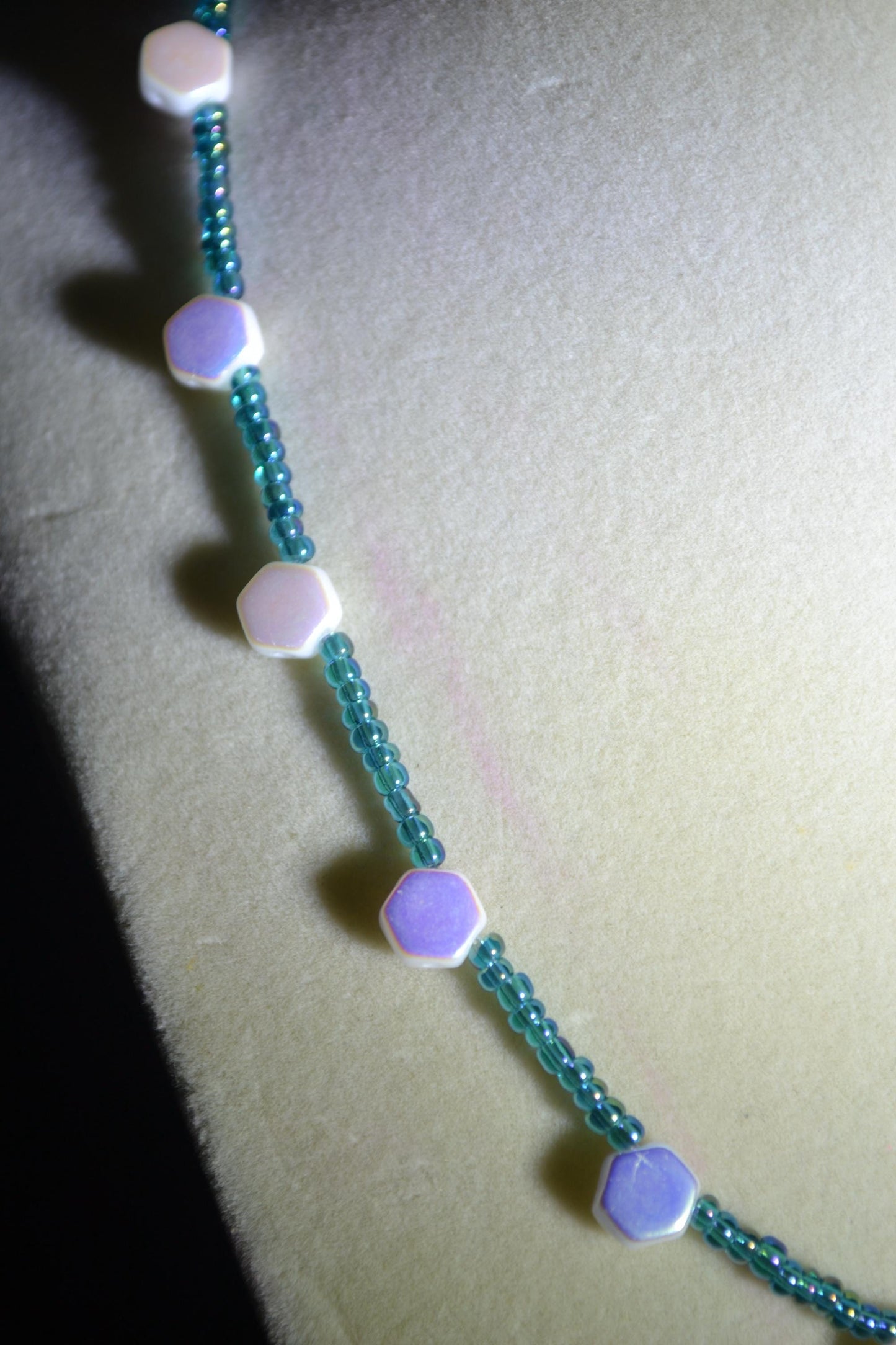 Multicolor glass bead necklace. Blue and iridescent white. Reversible