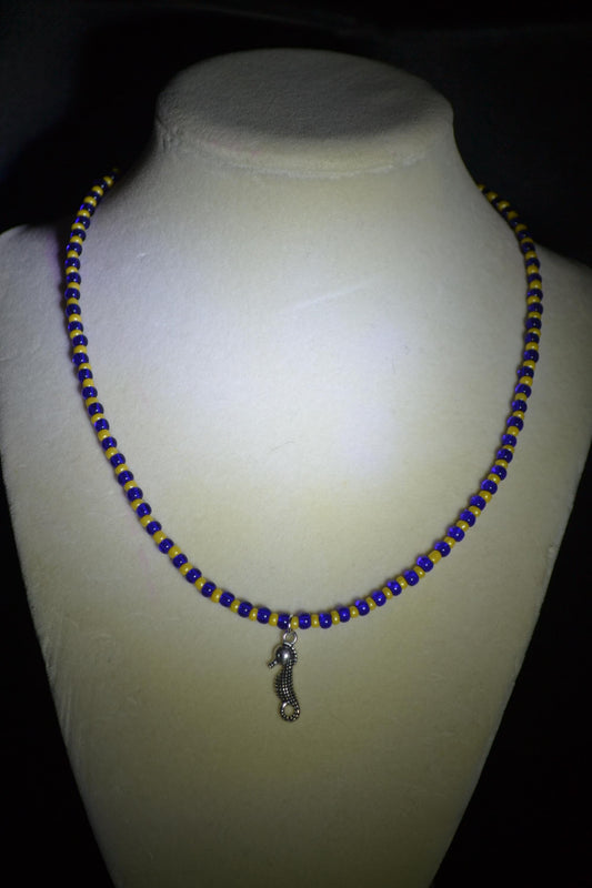 Seahorse pendant glass bead necklace. Blue and yellow