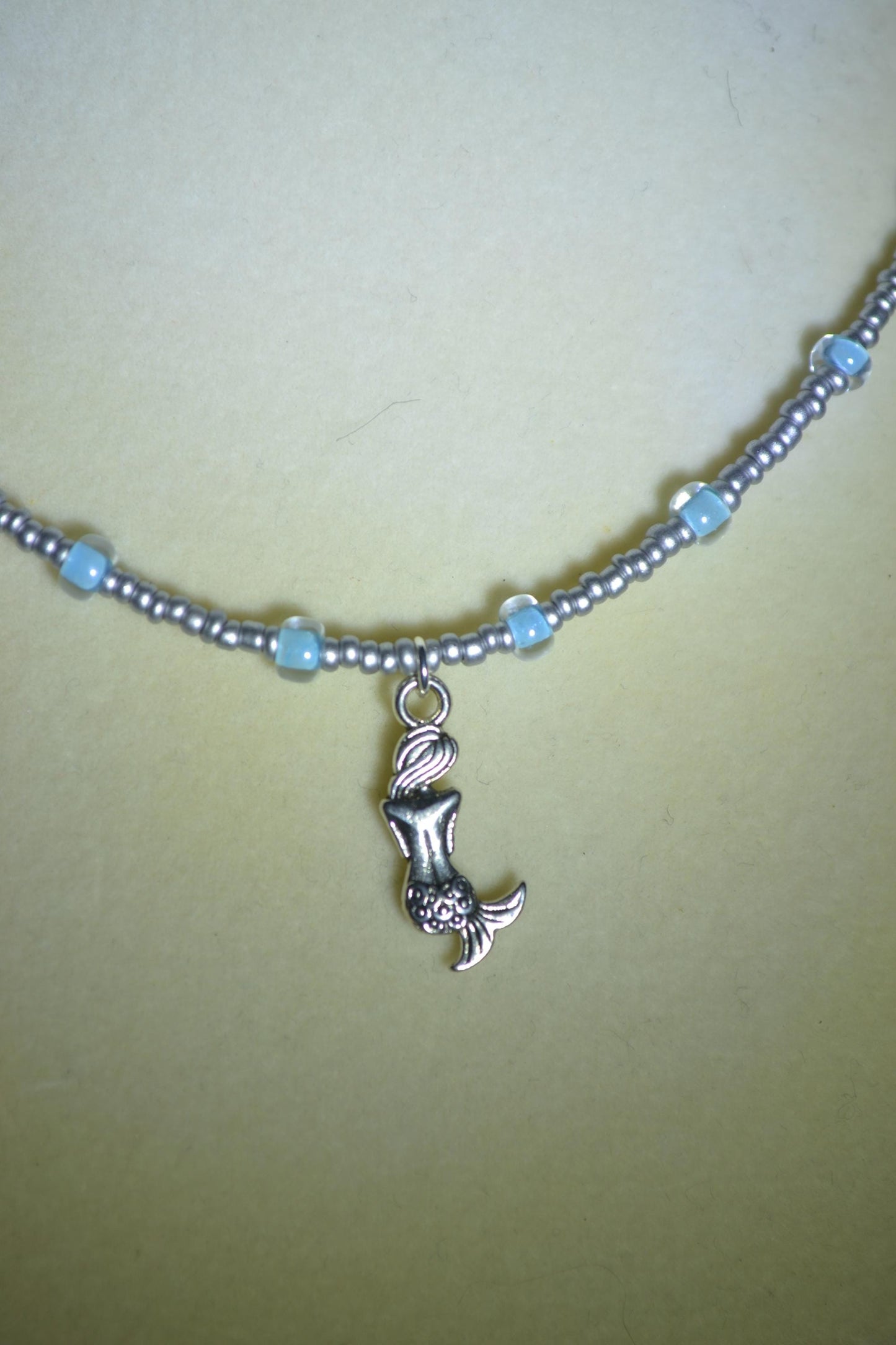Mermaid pendant glass bead choker. Silver and blue