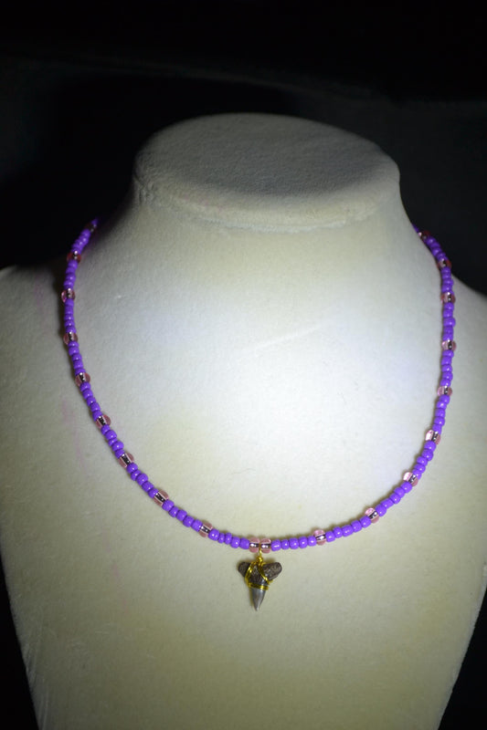 Wire wrapped sharks tooth beaded necklace. Purple and pink