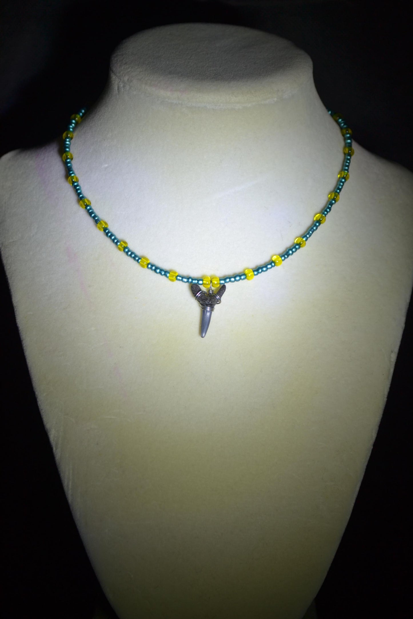 Wire wrapped sharks tooth beaded choker. Metallic blue and yellow