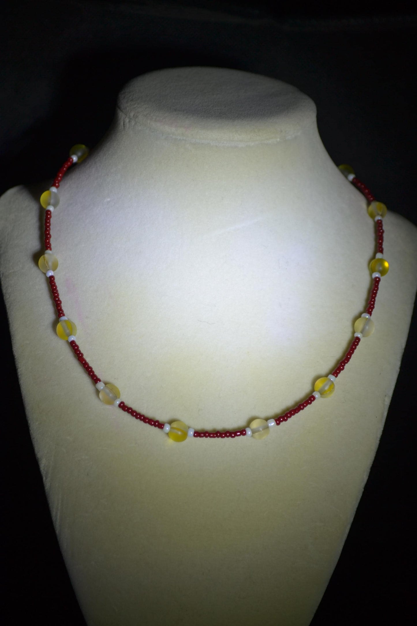 Multicolor glass bead necklace. Red, yellow, and white.