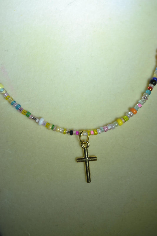 Cross pendant glass bead necklace. Rainbow