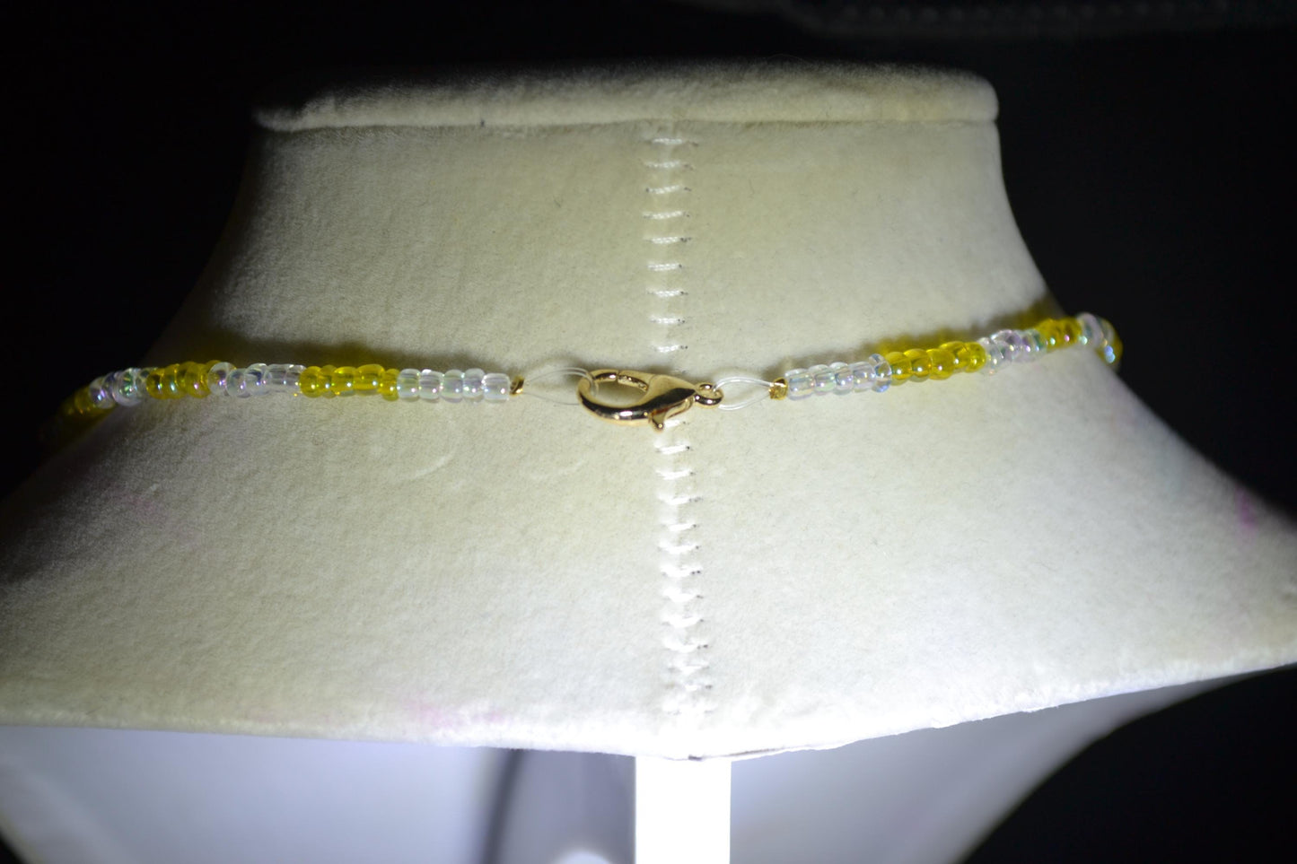 Butterfly pendant glass bead necklace. Yellow and iridescent