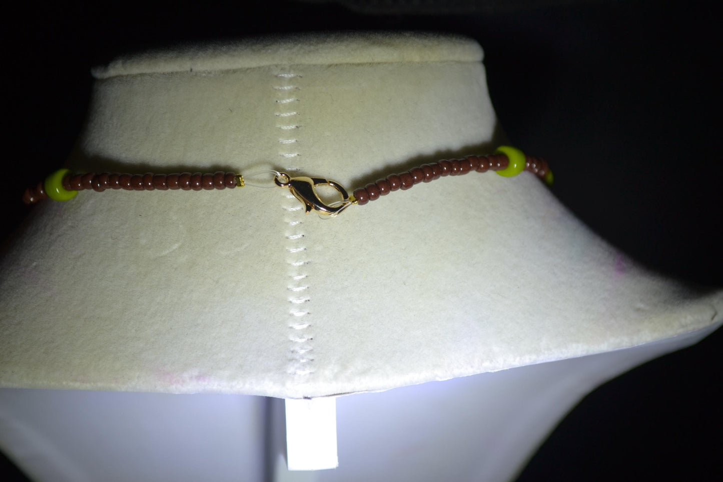 Skull and bones pendant glass bead choker. Brown and olive