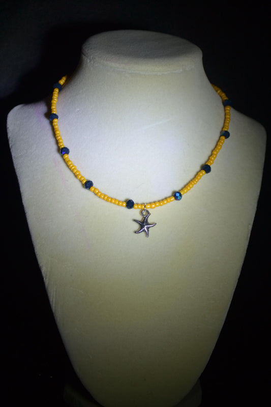 Starfish pendant glass bead choker. Tangerine and iridescent black