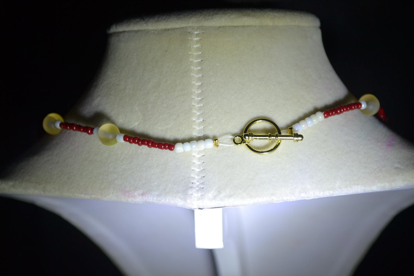 Multicolor glass bead necklace. Red, yellow, and white.