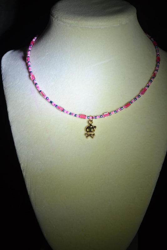 Skull and bones pendant glass bead choker. Pink and blue