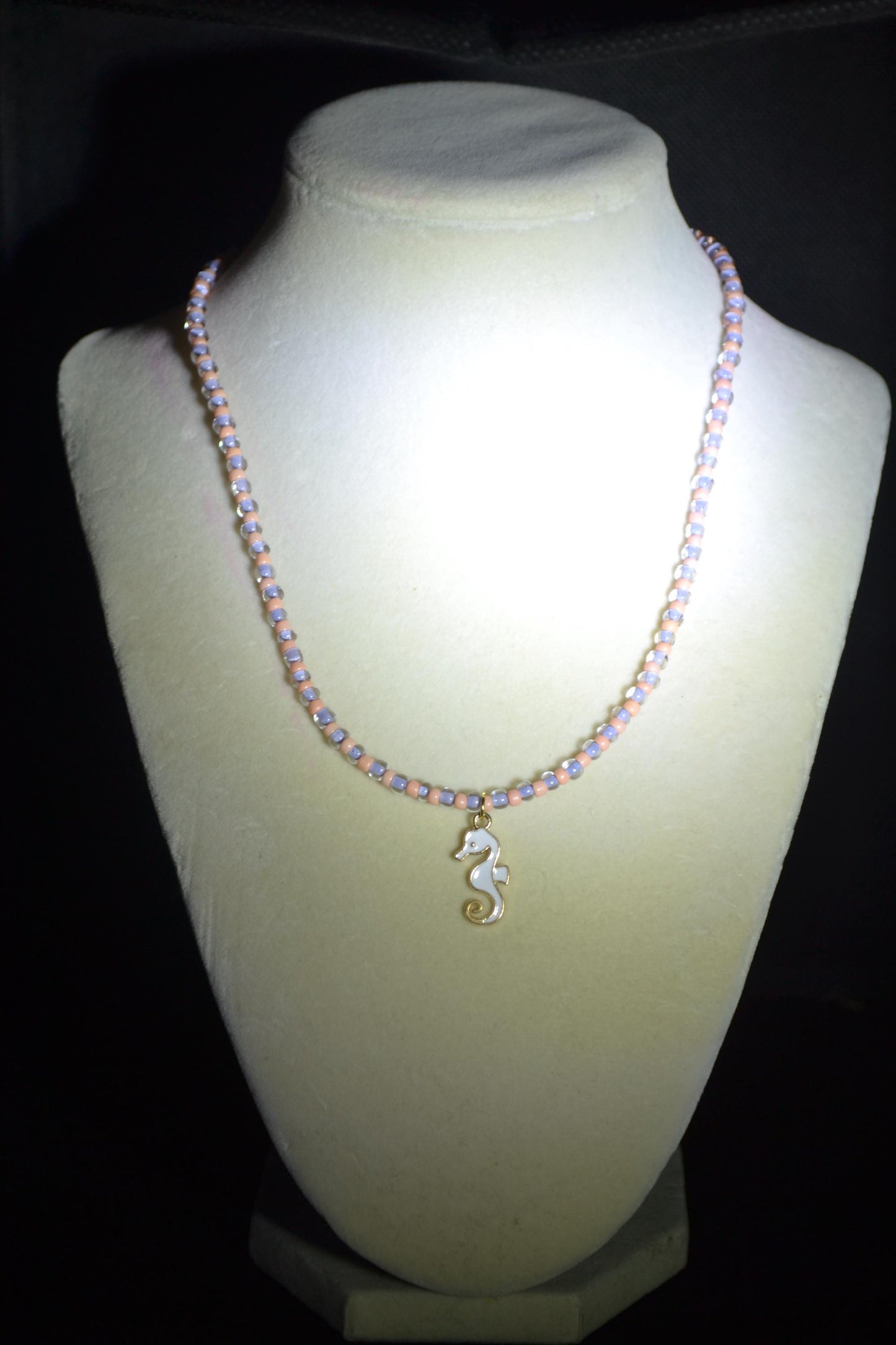 White seahorse pendant glass bead necklace. Peach and lavender