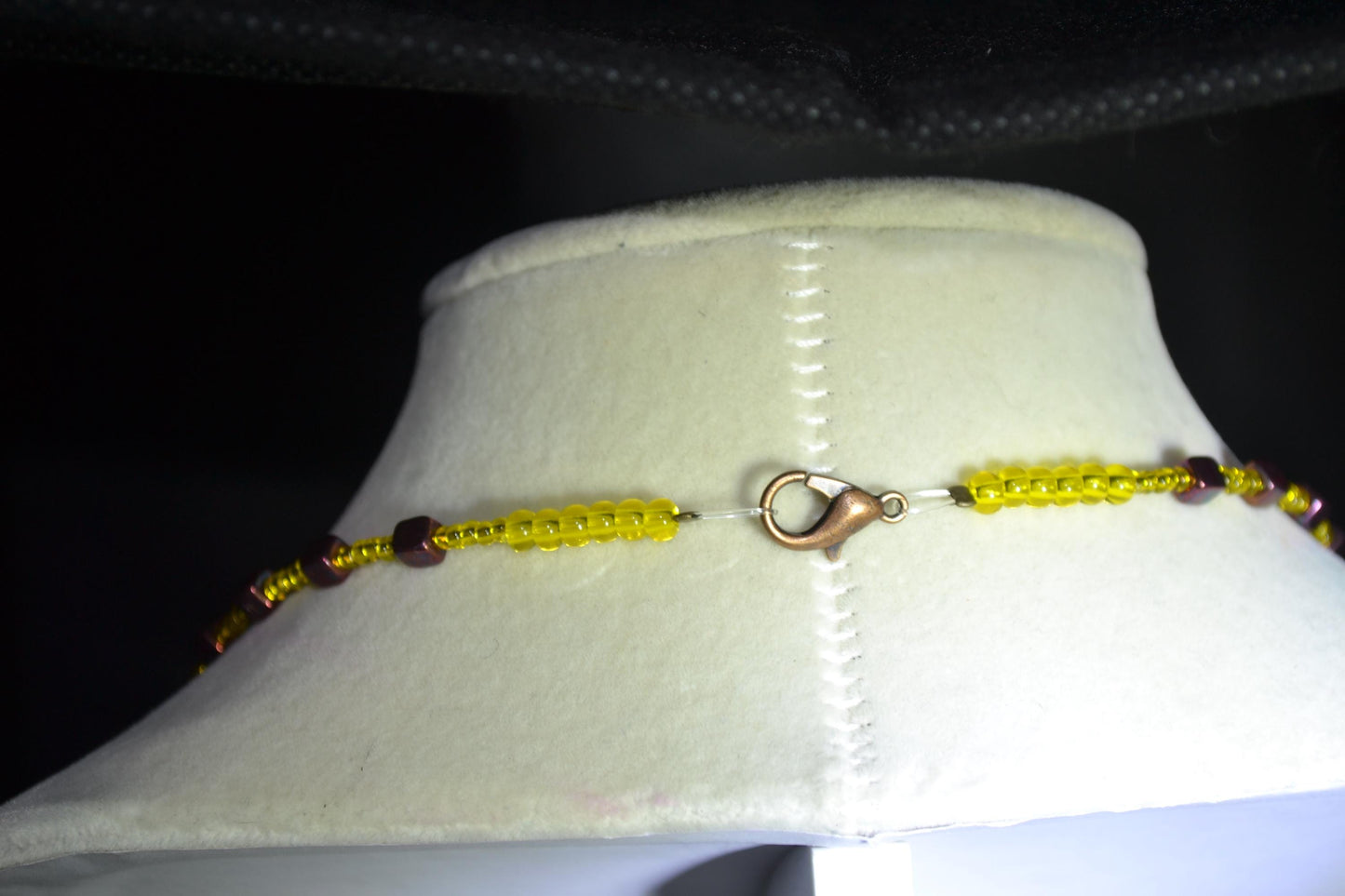 Wire wrapped sharks tooth beaded necklace. Yellow and gunmetal