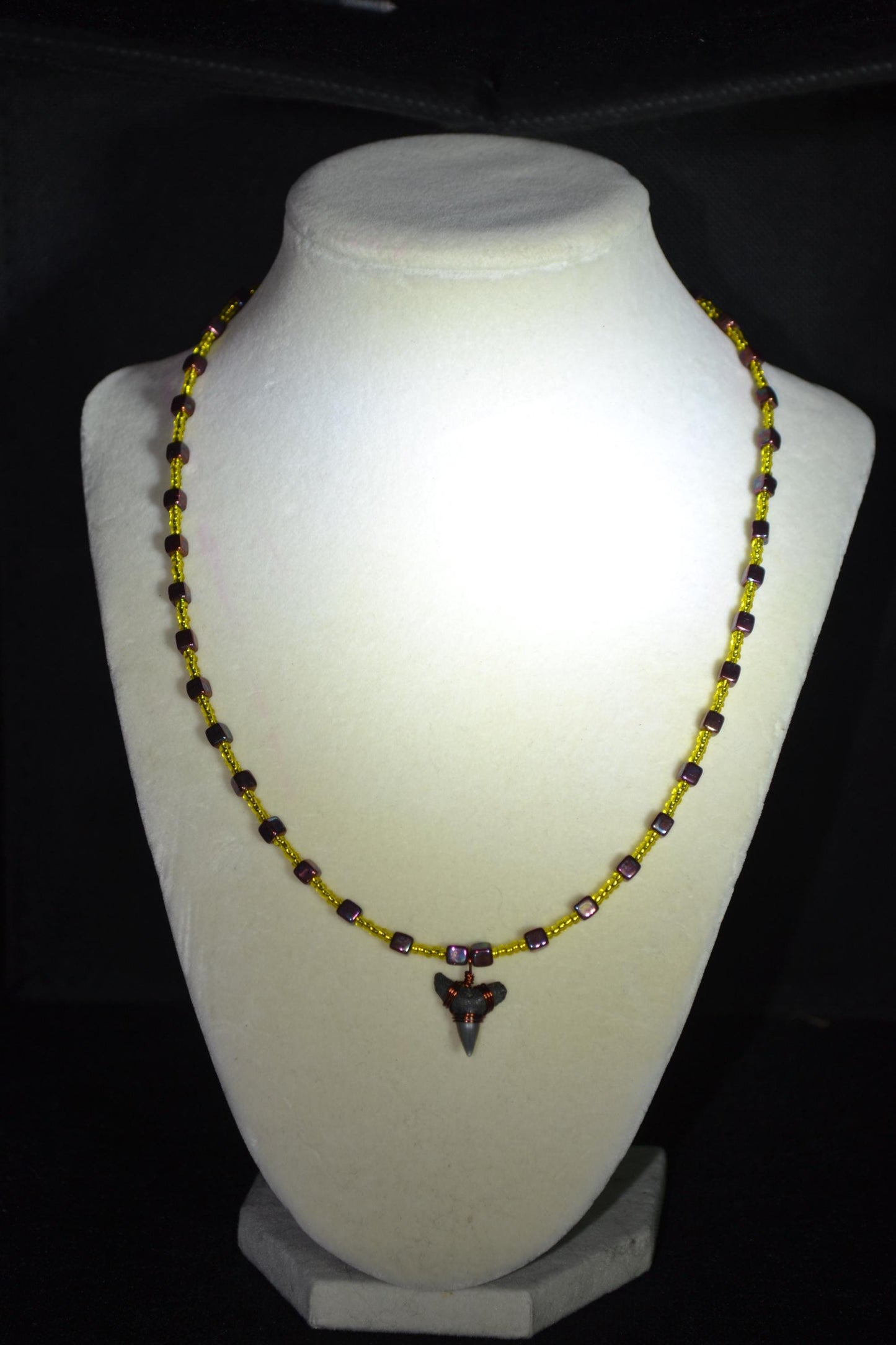 Wire wrapped sharks tooth beaded necklace. Yellow and gunmetal