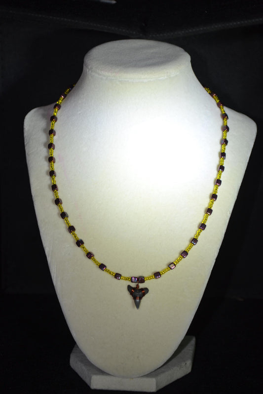 Wire wrapped sharks tooth beaded necklace. Yellow and gunmetal
