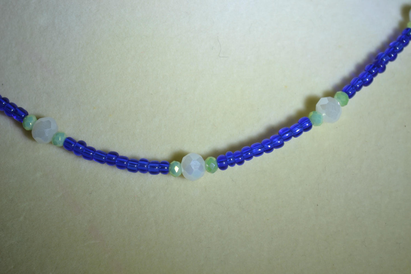 Multicolor glass bead necklace. Cobalt, green, and white
