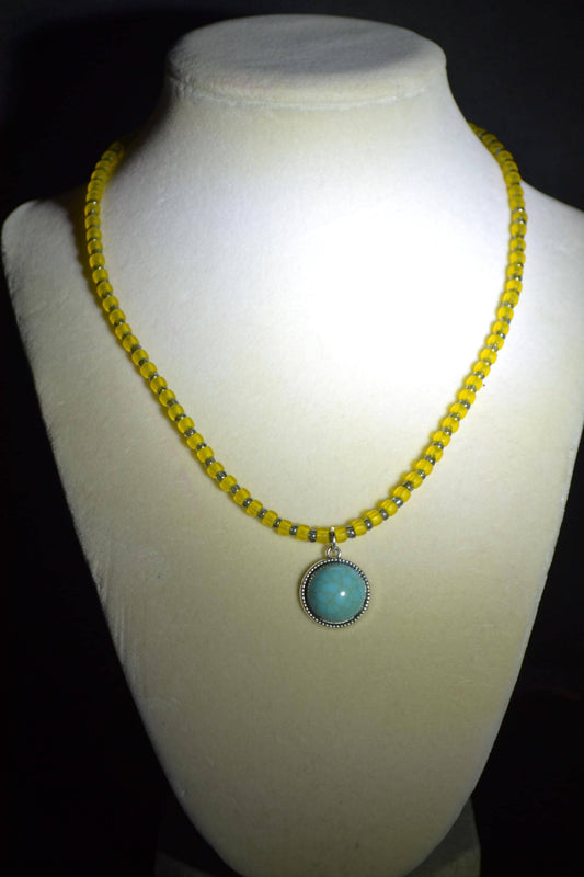 Turquoise pendant glass bead necklace. Yellow and grey