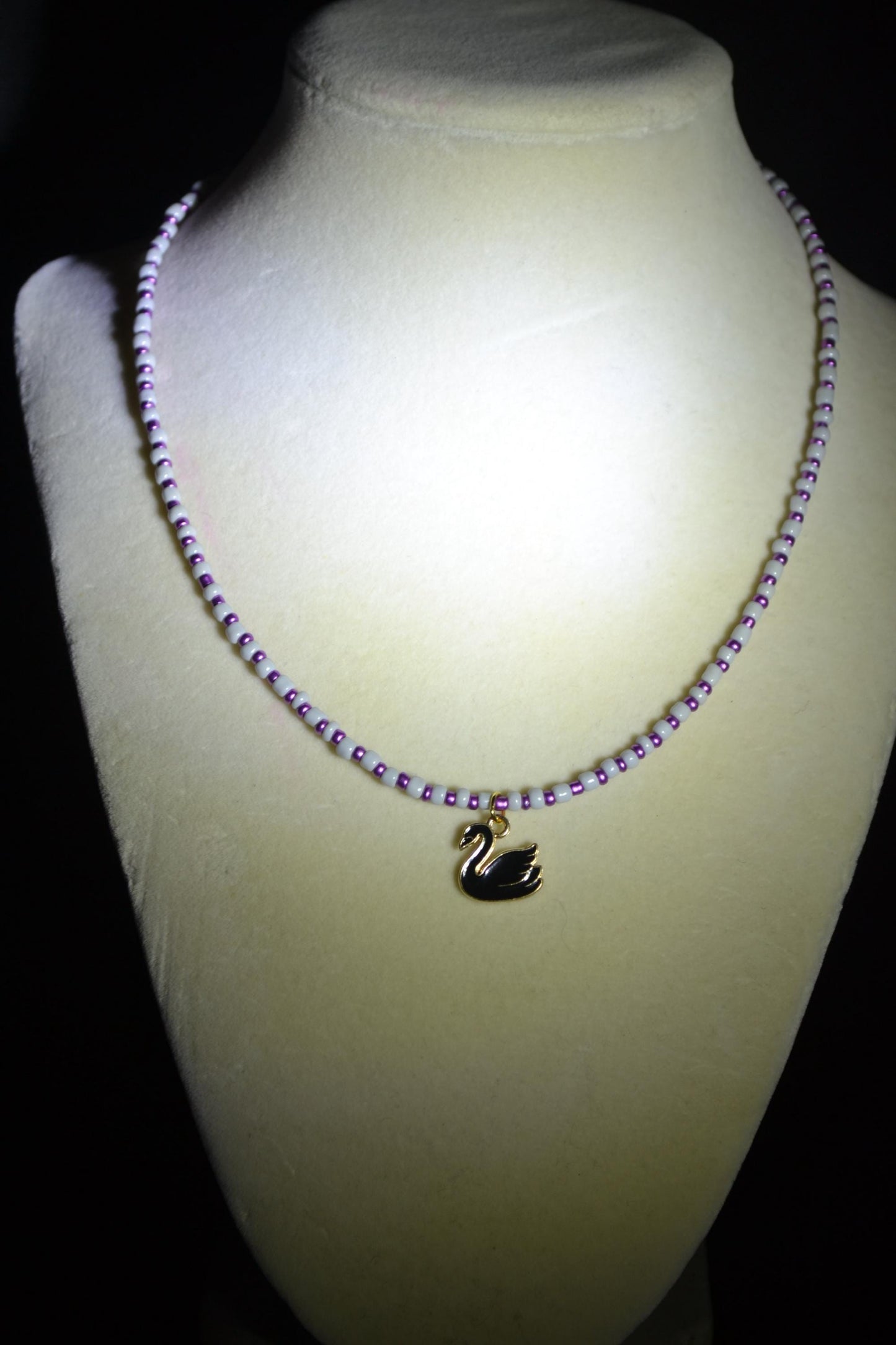 Black Swan pendant glass bead necklace. Grey and purple