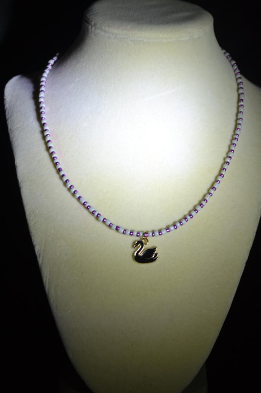 Black Swan pendant glass bead necklace. Grey and purple