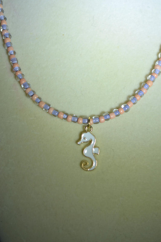 White seahorse pendant glass bead necklace. Peach and lavender