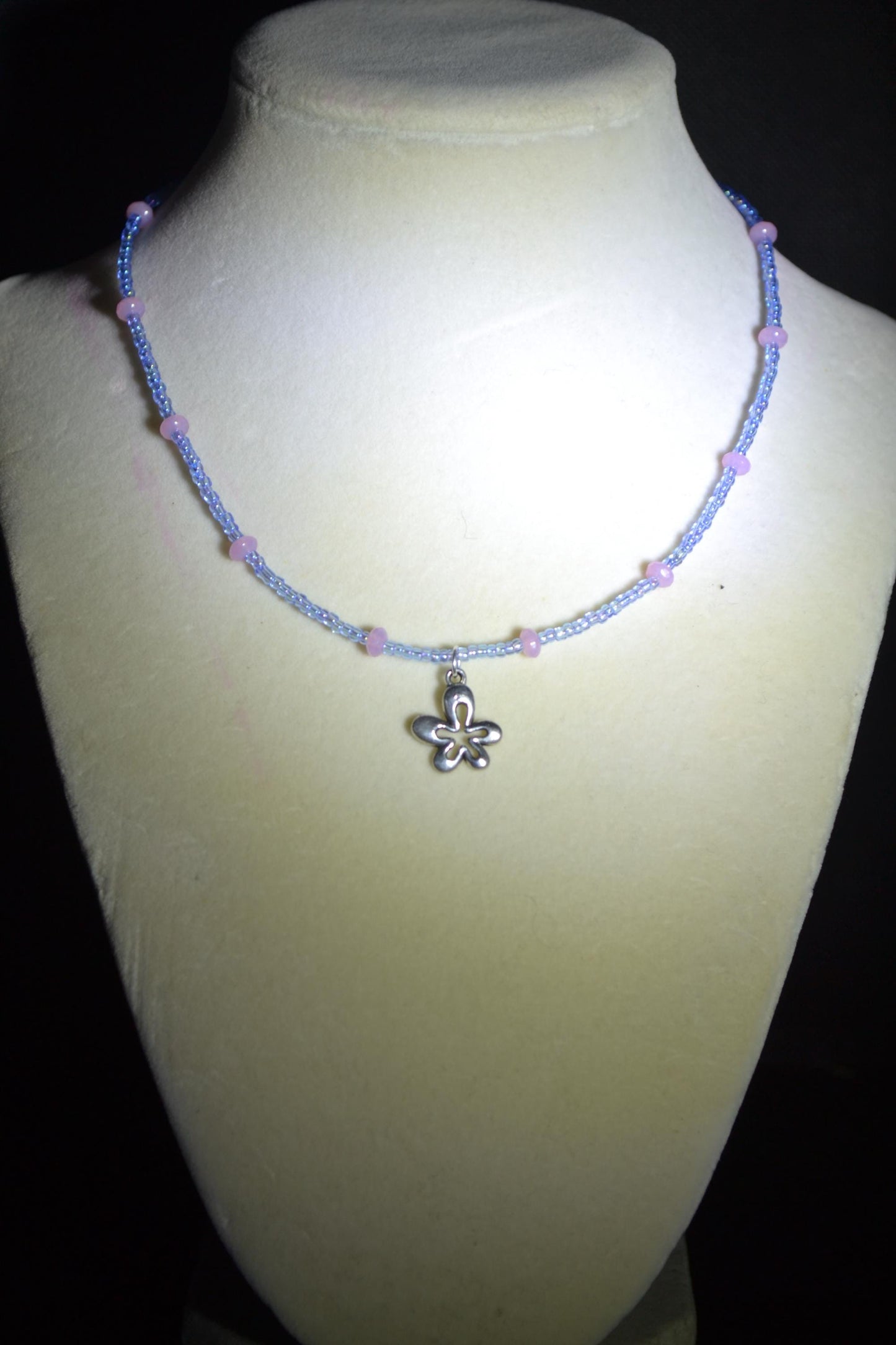 Silver flower pendant glass bead necklace. Pink and blue