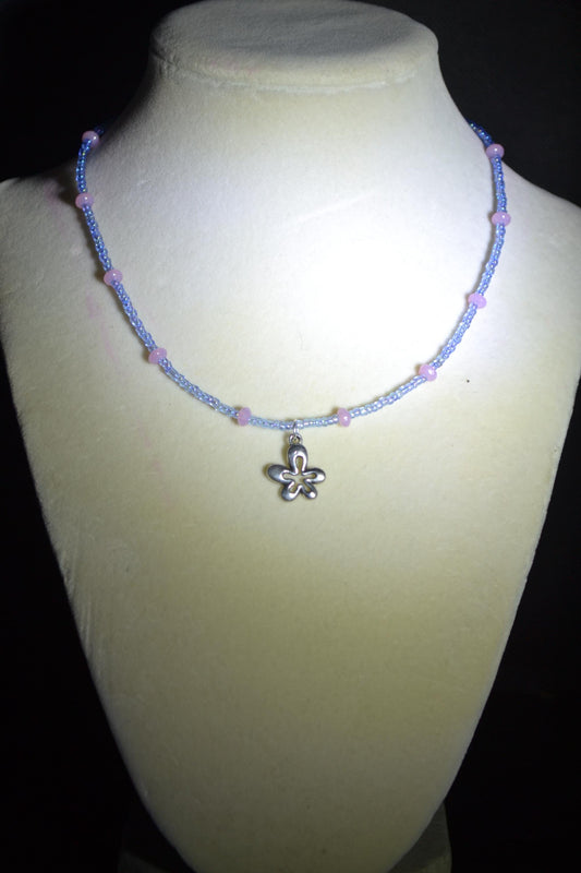 Silver flower pendant glass bead necklace. Pink and blue