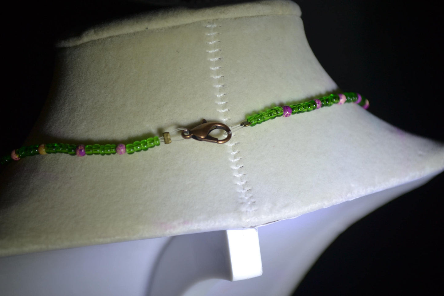 Wire wrapped sharks tooth beaded necklace. Purple and green