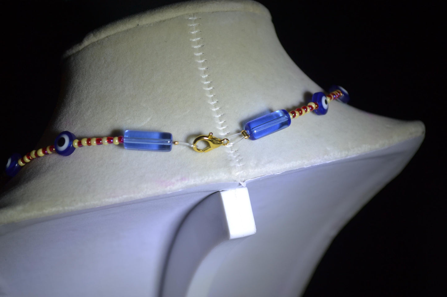 Multicolor glass bead necklace. Evil eye, red, yellow