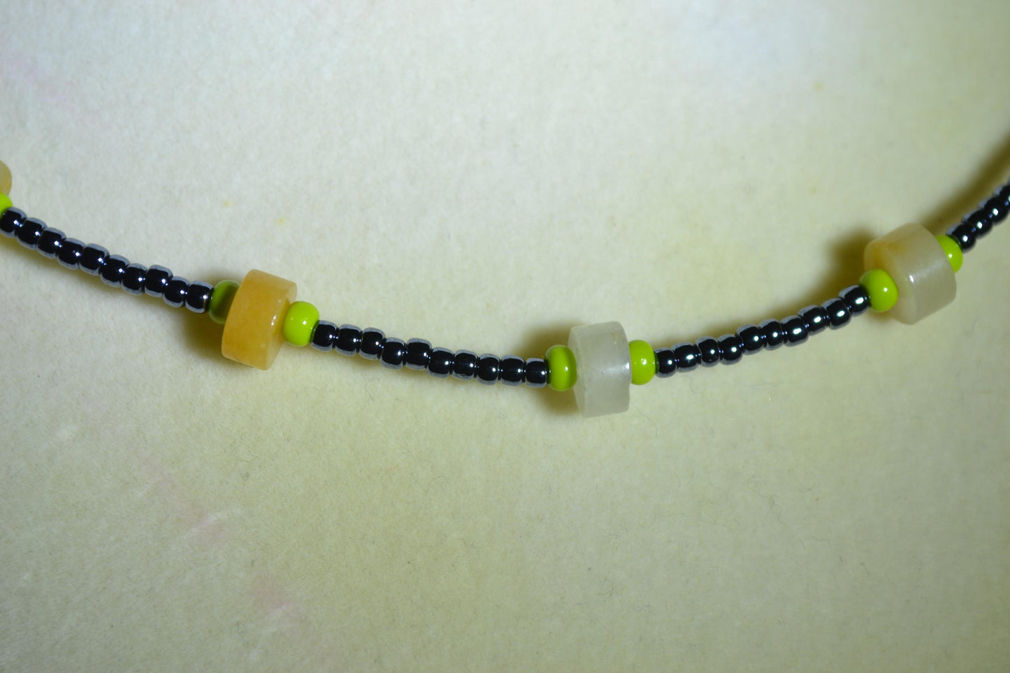 Multicolor glass bead necklace. Yellow jade, gunmetal, and olive