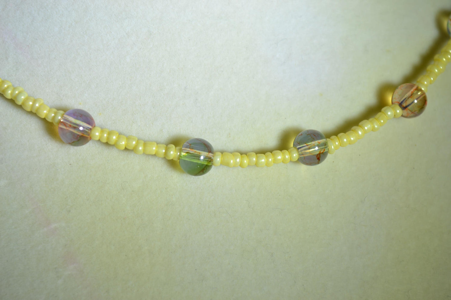 Multicolor glass bead necklace. Buttercream and topaz