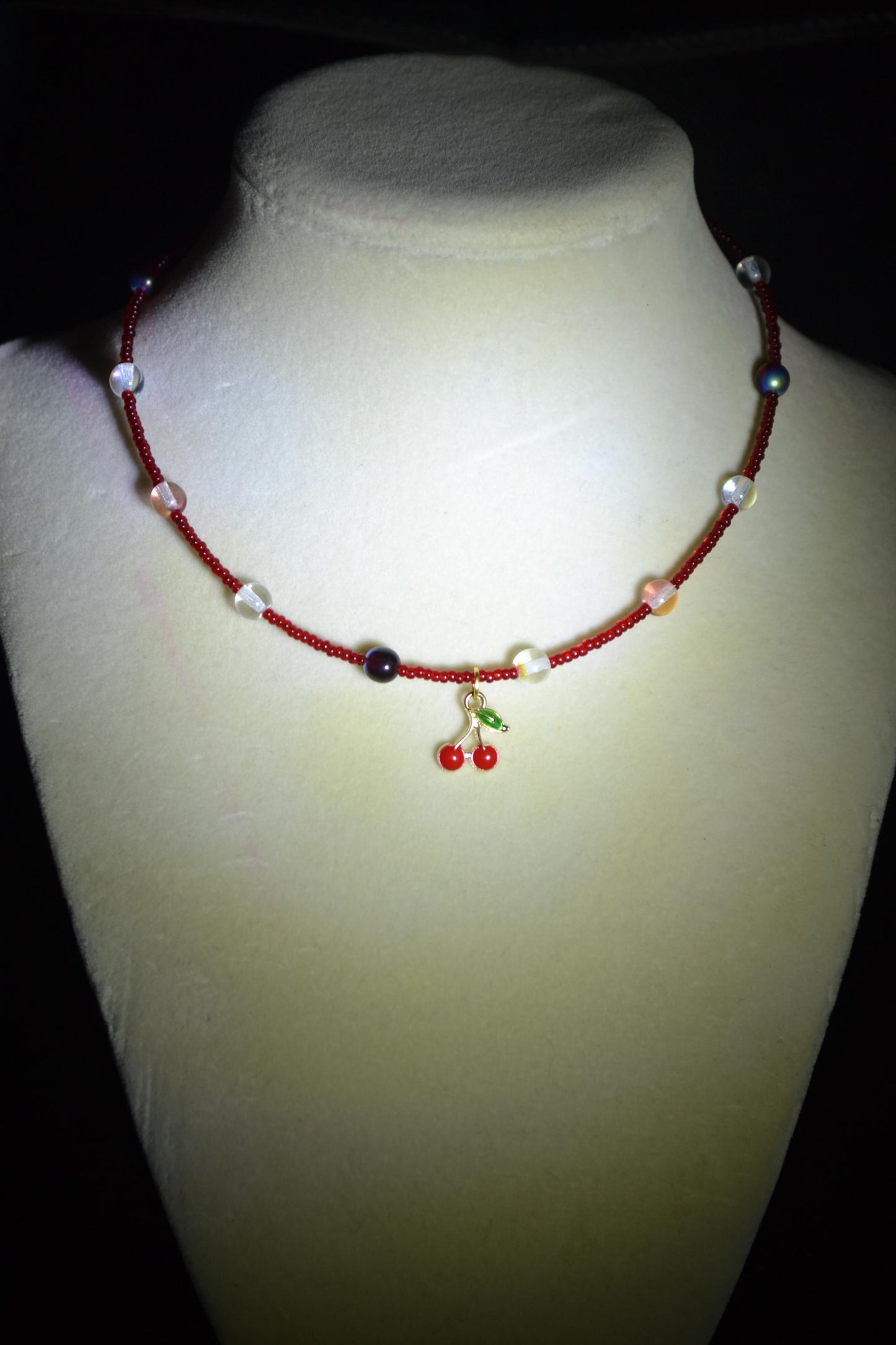 Cherry pendant glass bead choker. Mixed reds