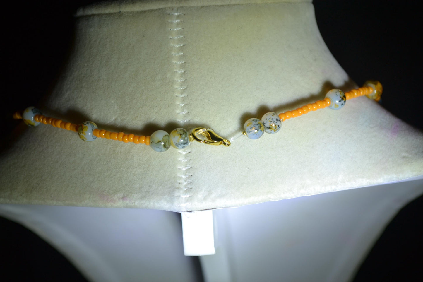 Black cat in pumpkin pendant glass bead choker. Orange and black