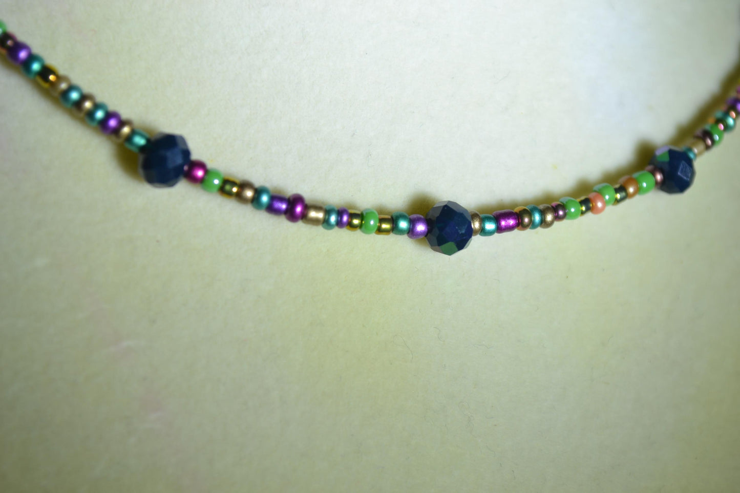 Multicolor glass bead necklace. Rainbow and metallic black