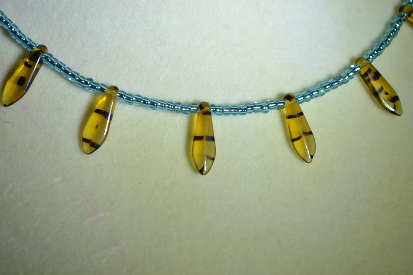 Multicolor glass bead necklace. Tortoise and teal