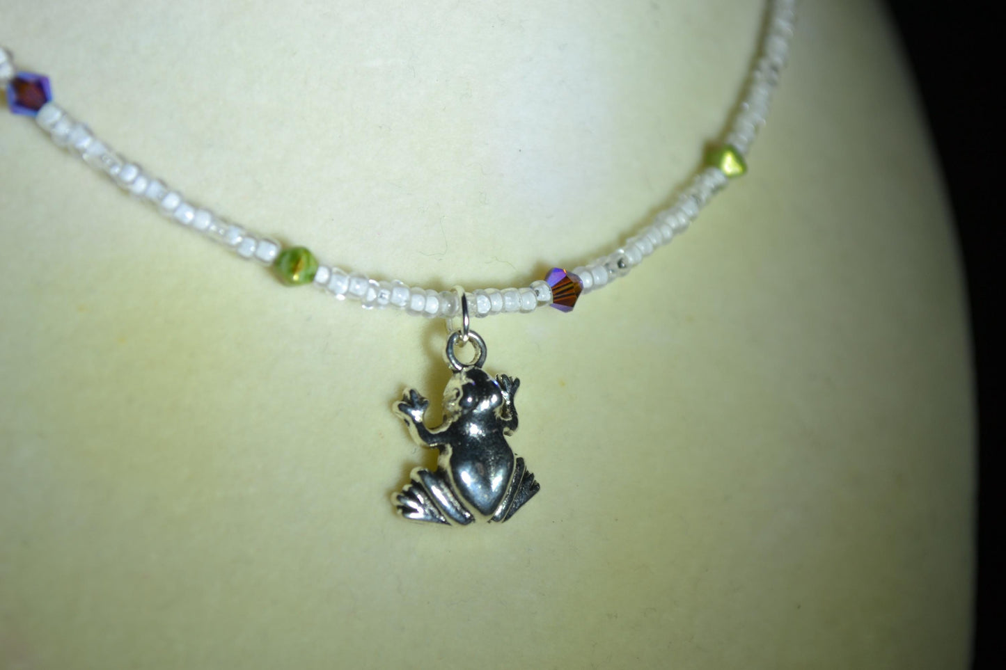 Frog pendant glass bead choker. White, green, and purple