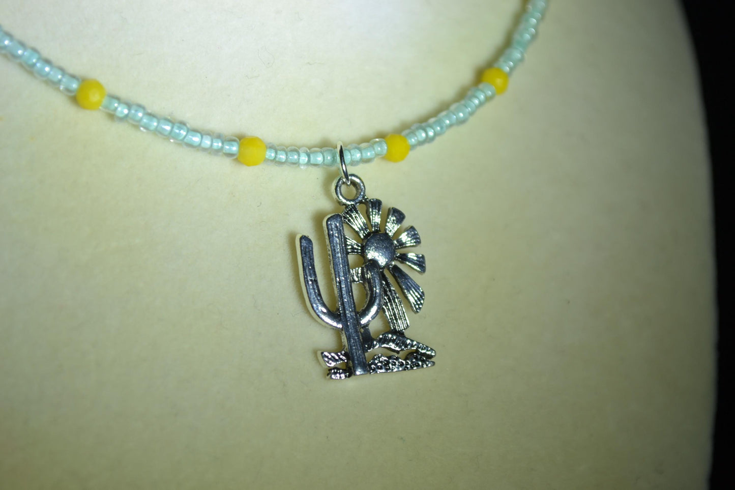 Cactus with Sun pendant glass bead choker. Blue and yellow