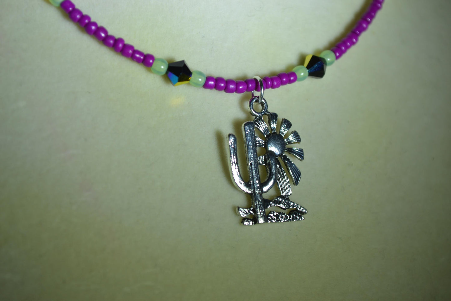 Cactus with Sun pendant glass bead choker. Berry, jadeite, and Swarovski crystal