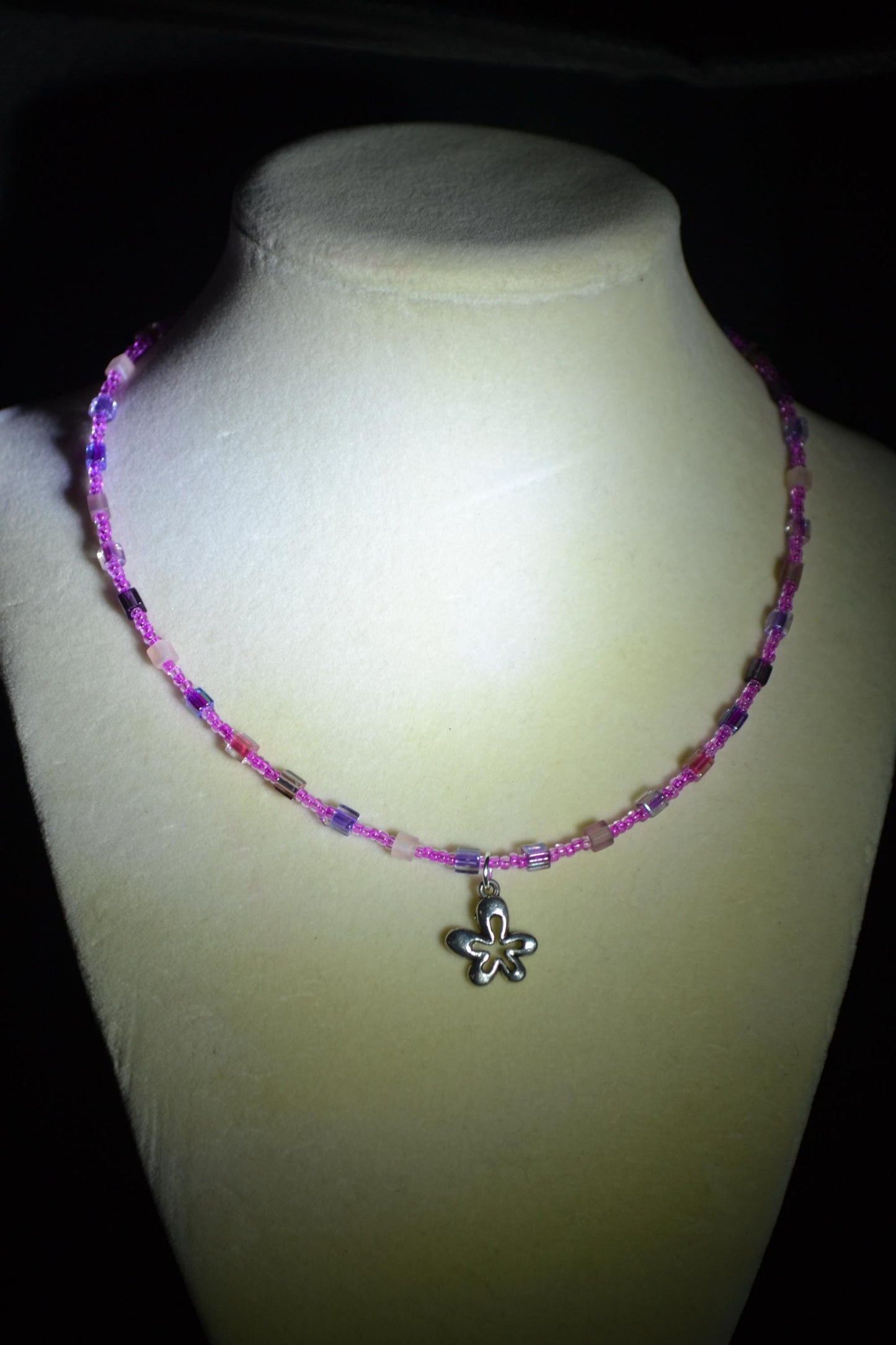 Flower pendant glass bead necklace. Pinks and purples