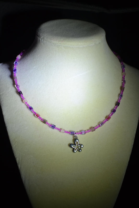 Flower pendant glass bead necklace. Pinks and purples