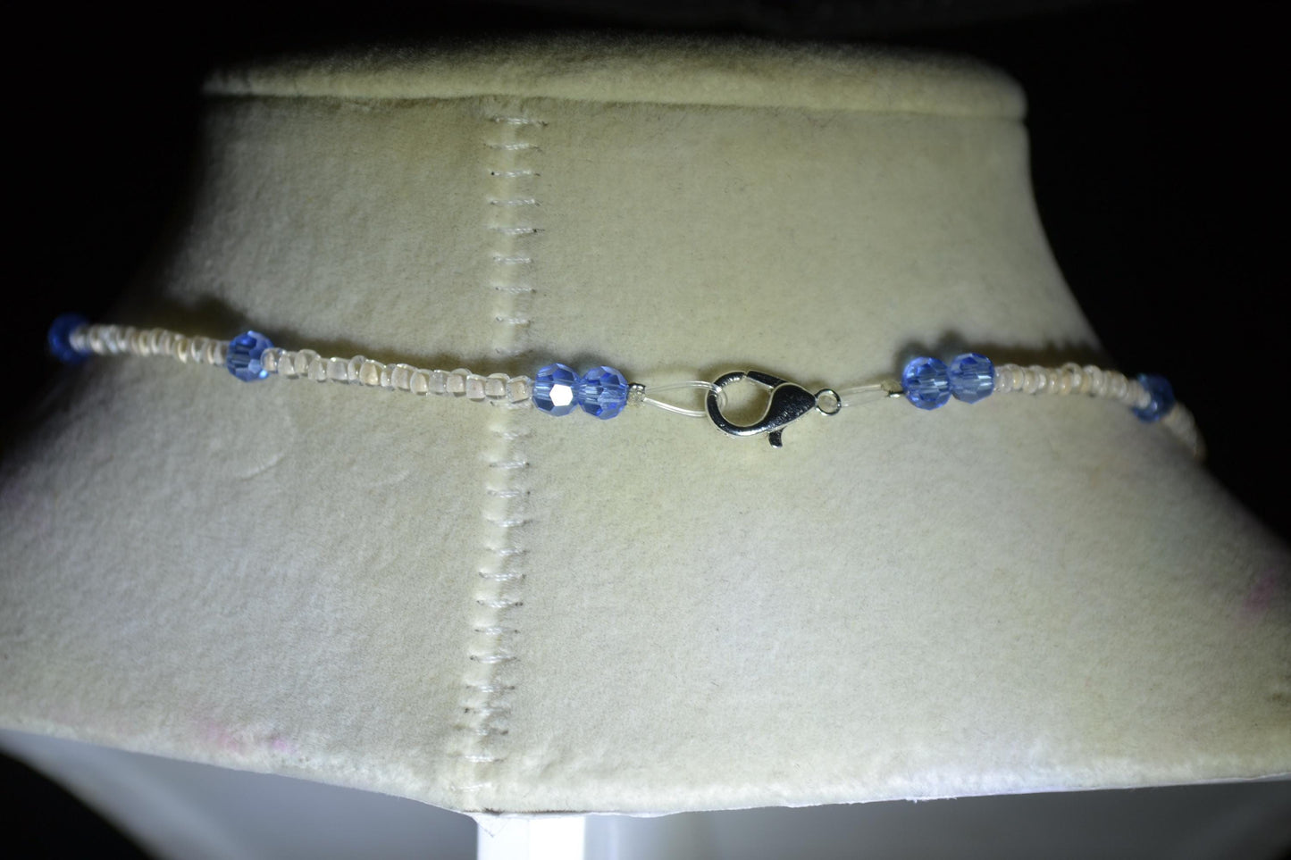 Shark jaws pendant glass bead necklace. Blue and white