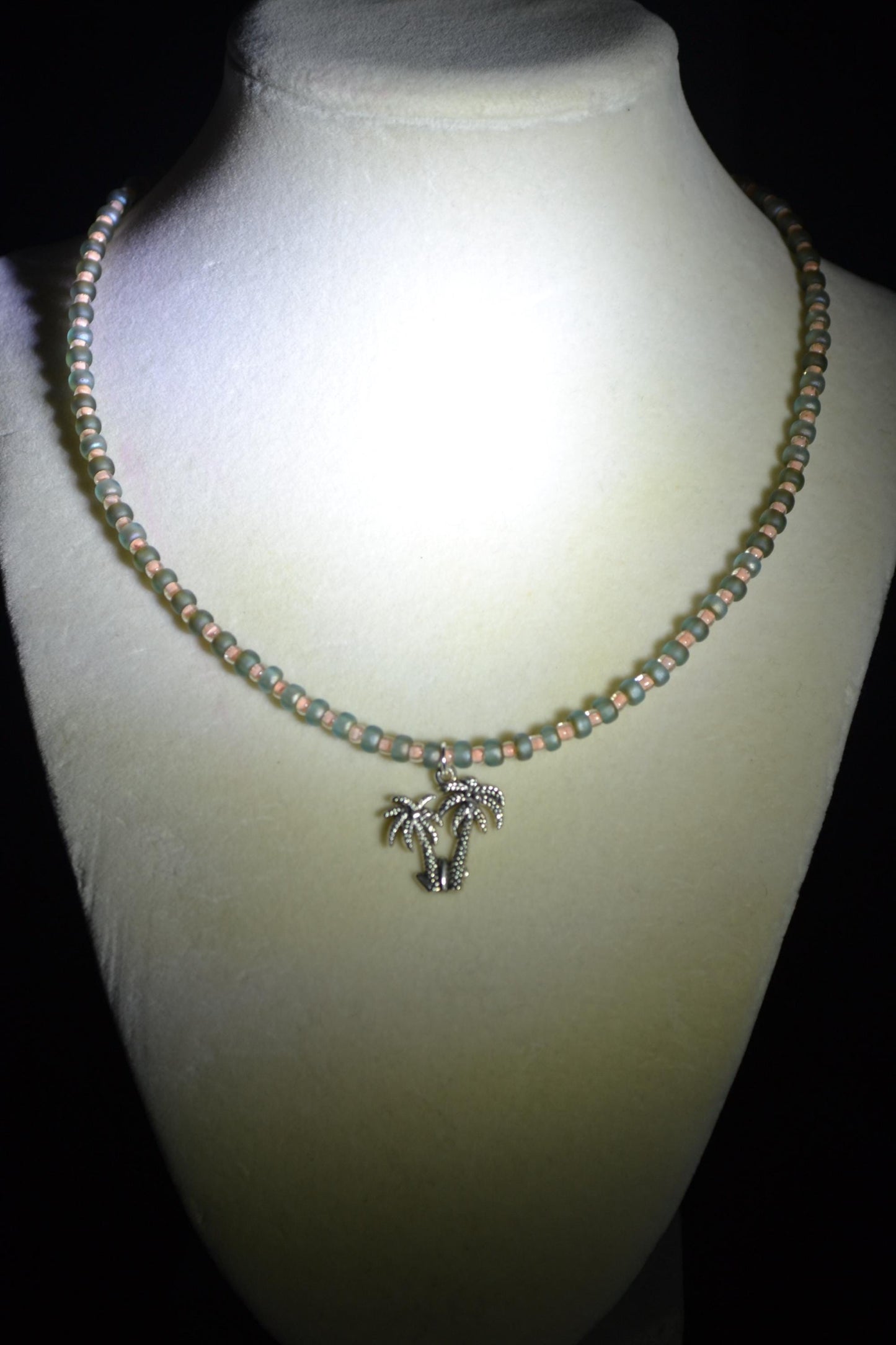 Palm trees pendant glass bead necklace. Coral and matte green