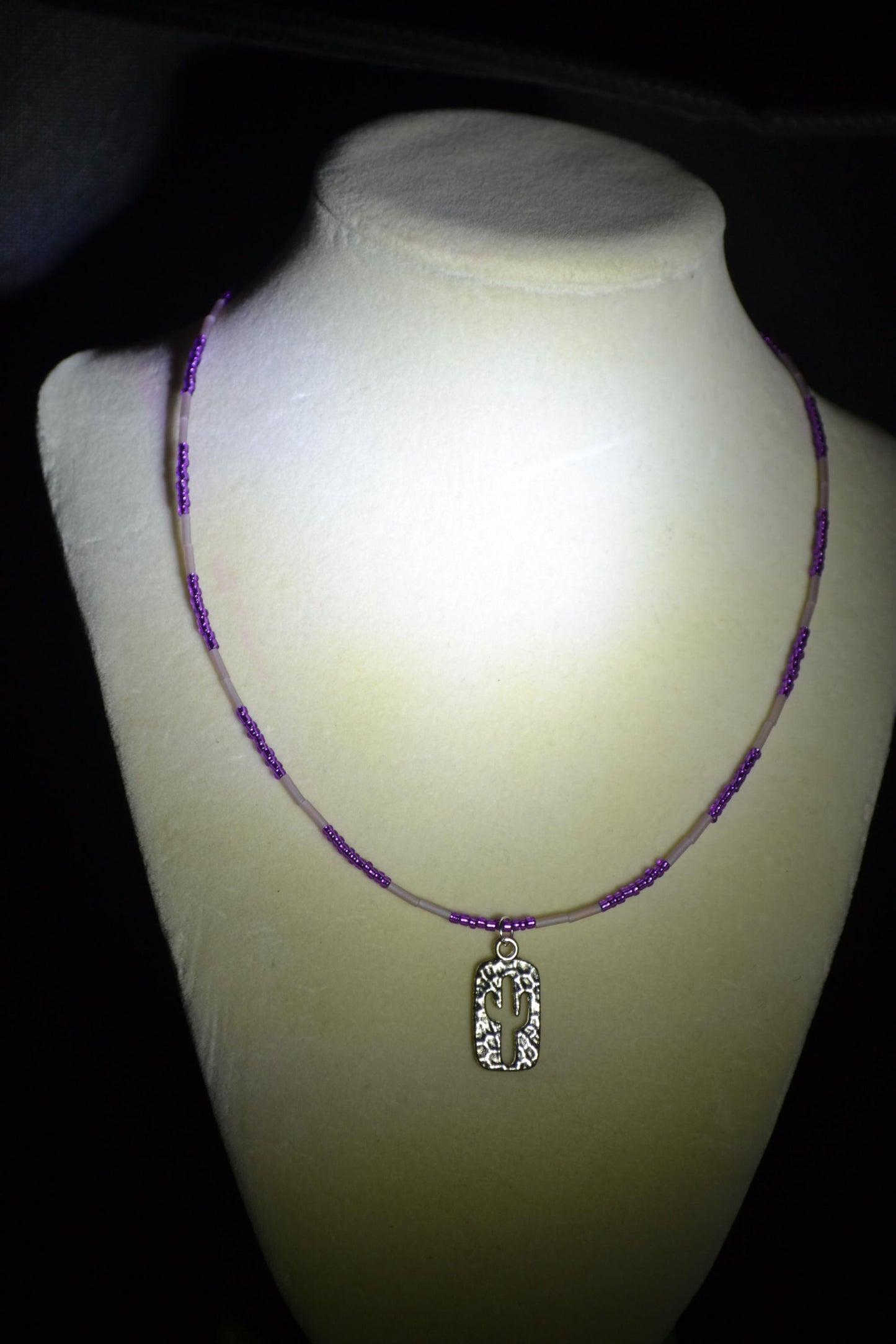 Hammered cactus pendant glass bead necklace. Purples