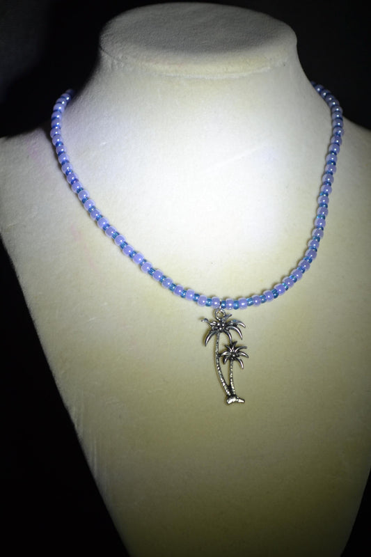 Palm Trees pendant glass bead necklace. Blue and lusty lavender