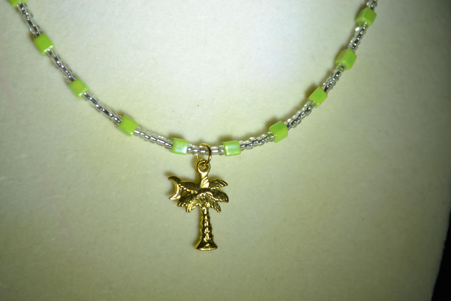 Palm with Moon pendant glass bead necklace. Green and silver