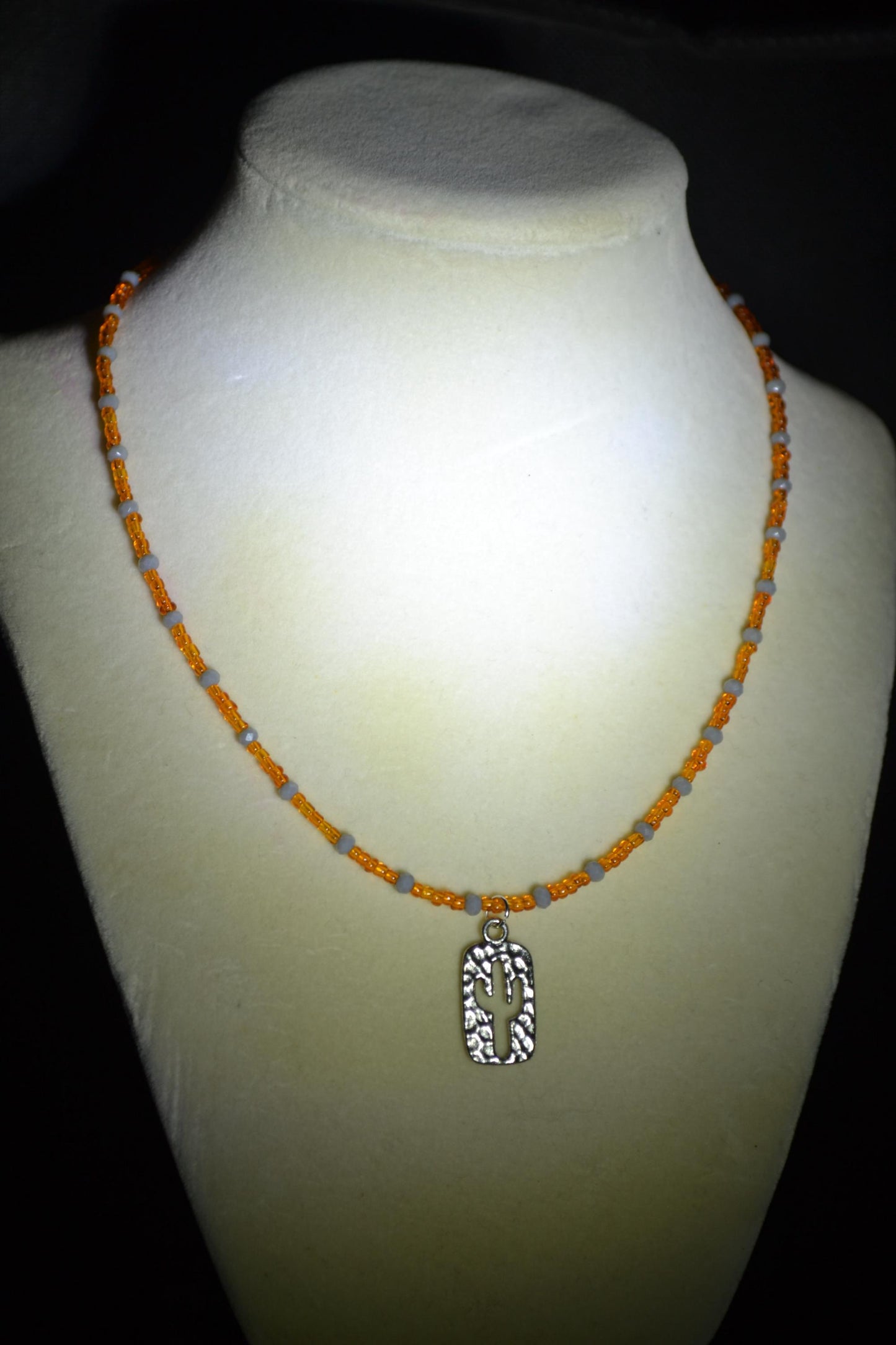 Hammered Cactus pendant glass bead necklace. Orange and grey