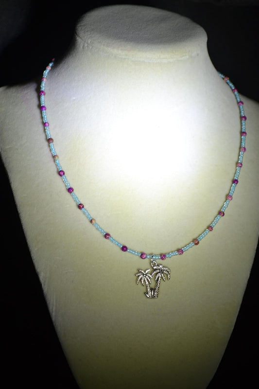 Palm Trees pendant glass bead necklace. Blue and purple