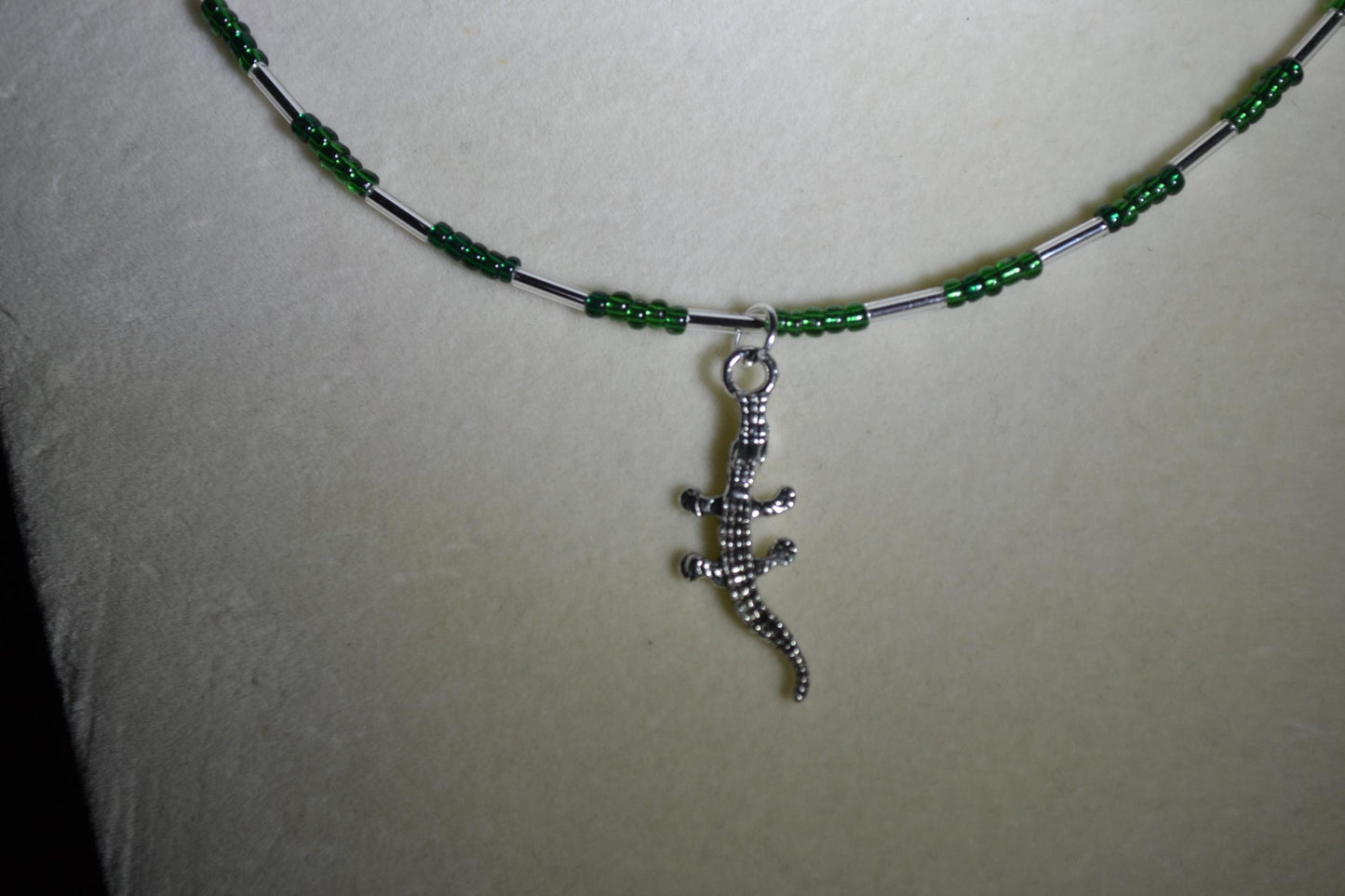 Alligator gecko pendant glass bead necklace. Green and silver