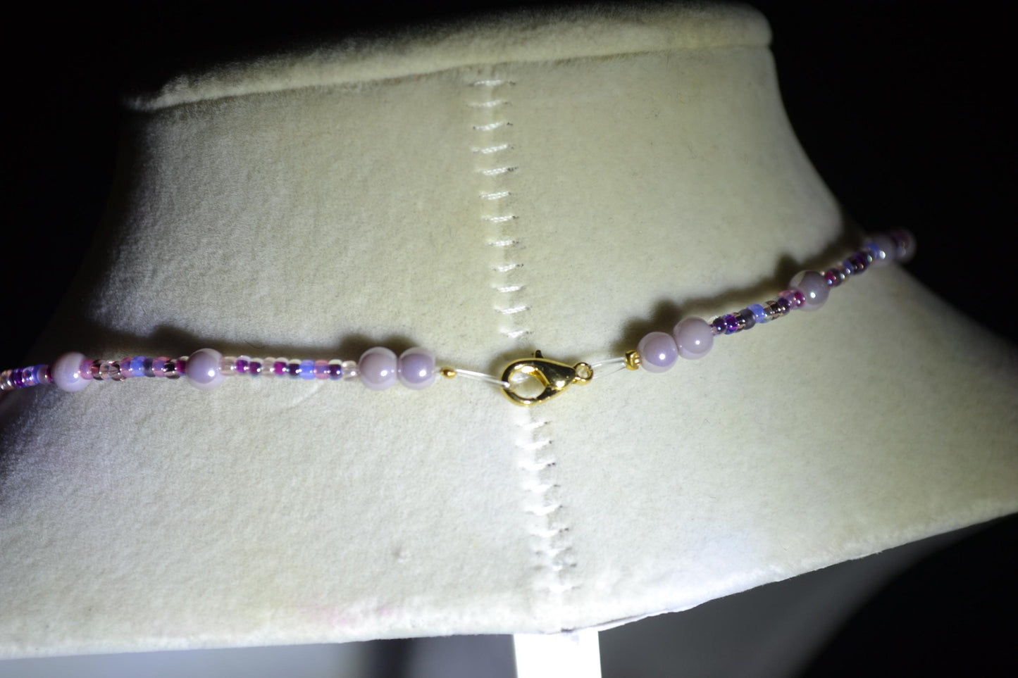 Fairy pendant glass bead necklace. Mixed purples