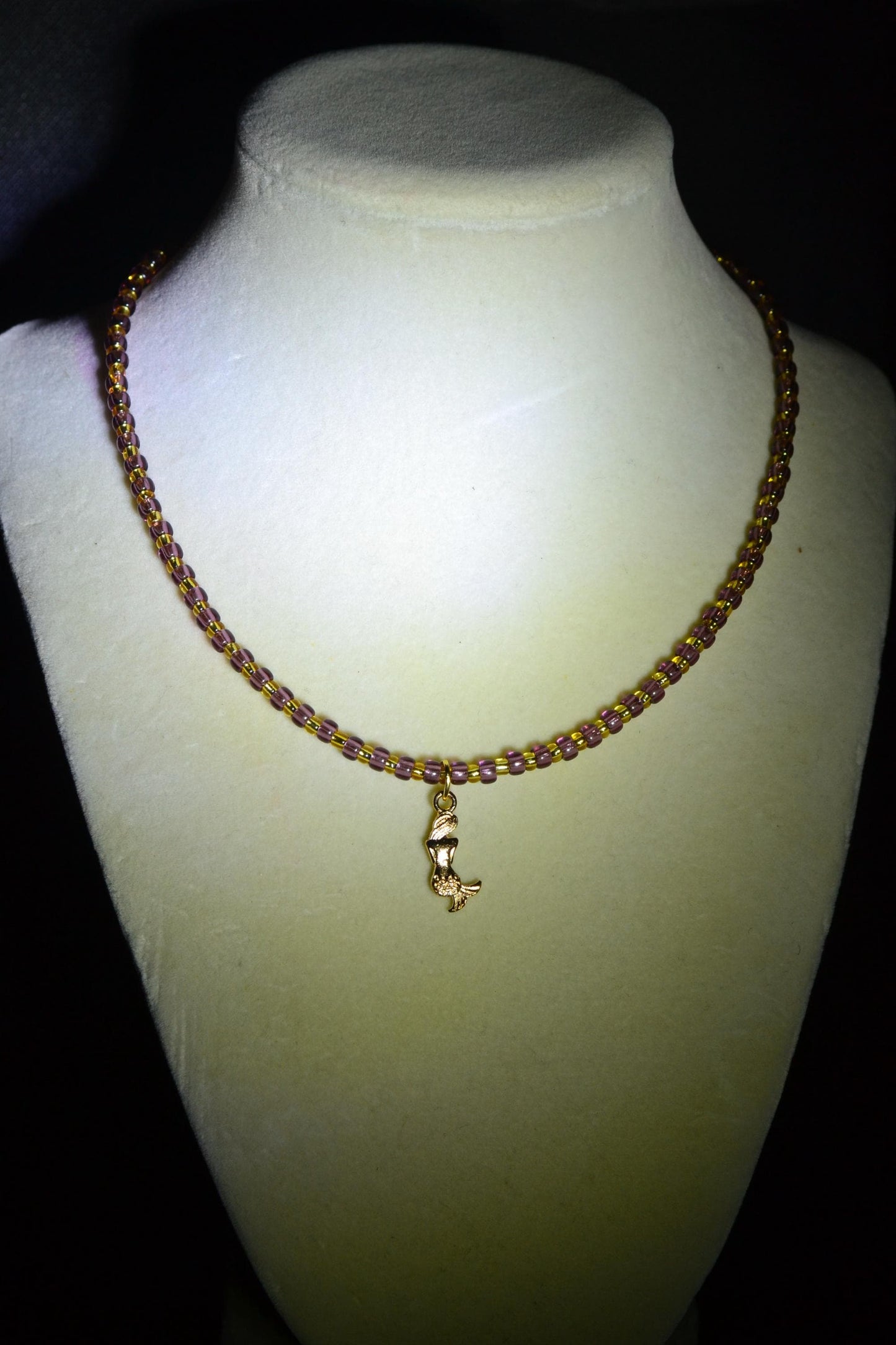 Mermaid pendant glass bead necklace. Amethyst and gold