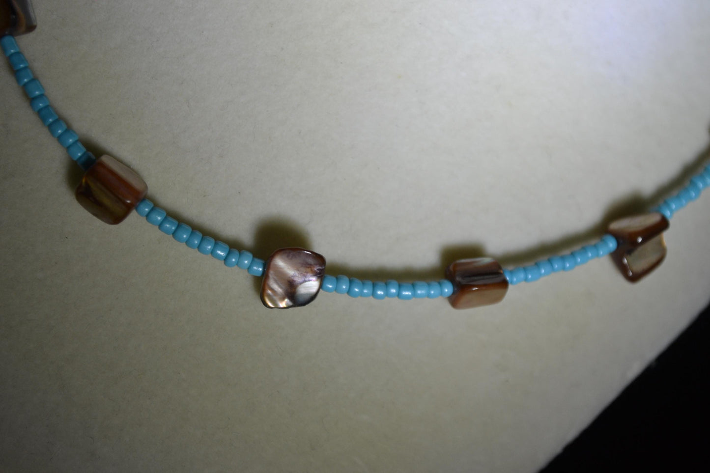 Multicolor glass bead necklace. Aqua and brown abalone